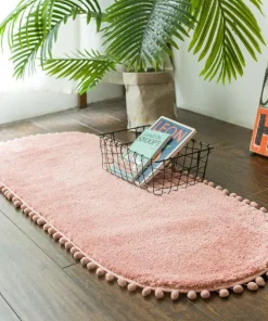 Pom-pom Trimmed Oval Anti-skid Rug