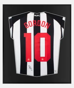 Framed Gordon Signed Newcastle United Shirt, Champions League [Lite]
