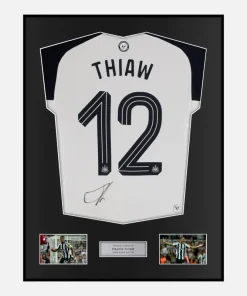 Framed Malick Thiaw Signed Newcastle United Shirt Home [Classic]