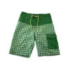 Peak Performance 9-11 years green checked swim trunks